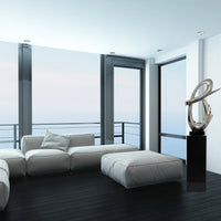 CHROME FLUID ABSTRACT FLOOR SCULPTURE WITH BLACK STAND, 59" TALL